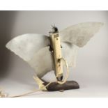 AN ELECTRIC HEATER as a butterfly on a branch. 27ins high.
