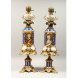 A SUPERB PAIR OF 19TH CENTURY FRENCH PORCELAIN AND GILT BRONZE LAMPS ON STANDS, painted with