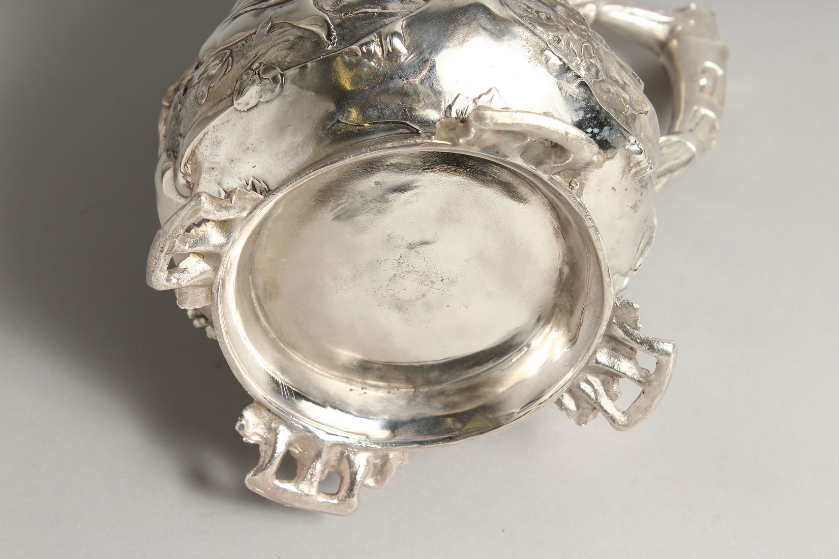 A GOOD W.M.F PLAIN TANKARD covered with classical repousse decoration. 16ins high. - Image 6 of 6