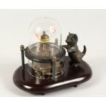 A MECHANICAL CAT AND DOG CLOCK 6ins high
