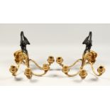 A VERY GOOD PAIR OF 19TH CENTURY FRENCH BRONZE AND ORMOLU THREE LIGHT WALL SCONCES with winged