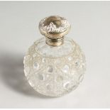 A VICTORIAN CUT GLASS SCENT BOTTLE with silver top. Birmingham 1896