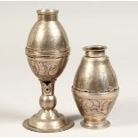 TWO SMALL SILVER VASES one with a coin in the base. Republic of Pervana 4ins & 5.5ins high.