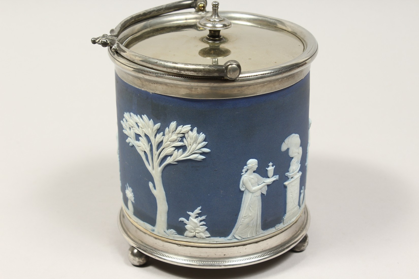 A WEDGWOOD BLUE AND WHITE JASPER WARE BISCUIT BARREL. - Image 2 of 9