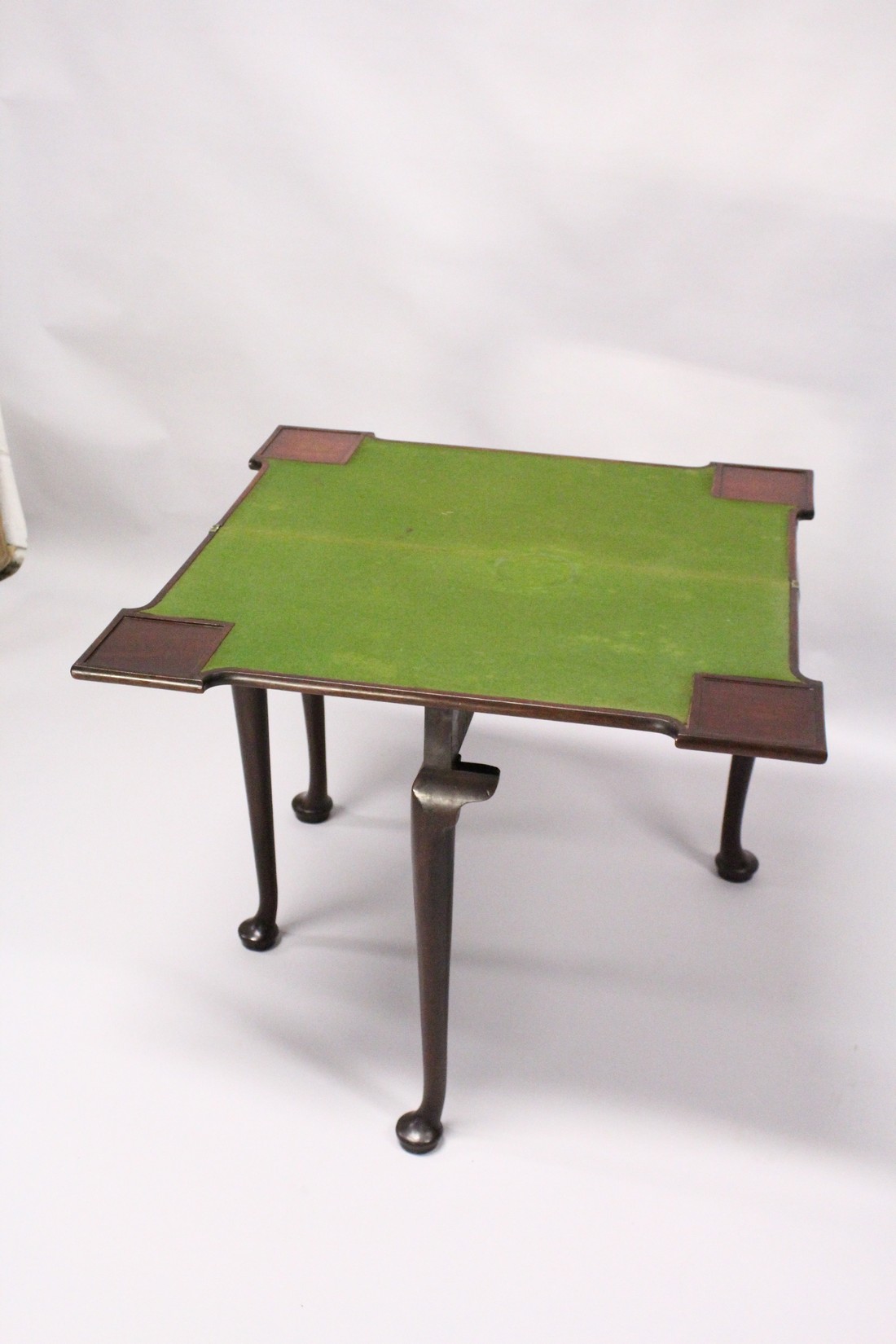 A GEORGE III MAHOGANY FOLD OVER CARD TABLE with a shaped rectangular top, green beize lining with - Image 4 of 5