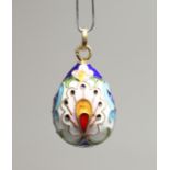 A RUSSIAN SILVER AND ENAMEL EGG PENDANT