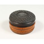 A GOOD 19TH CENTURY TORTOISESHELL AND WOOD CIRCULAR BOX. 3.5ins diameter