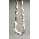 A LARGE BAROQUE PEARL NECKLACE with silver magnetic clasp 46cm