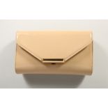 AN L. K. BENNETT BEIGE PATENT LEATHER CLUTCH BAG with dust cover, as new.