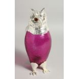 A LARGE PLATED CRANBERRY OWL CLARET JUG with glass eyes 11.5ins high.