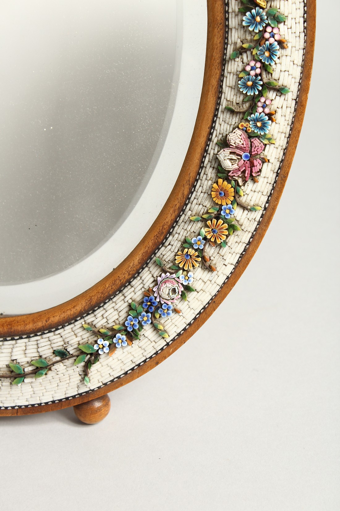 A GOOD MOSIAC FRAMED SHAPED EASEL MIRROR with a band of flowers 13.5ins high. - Image 5 of 8