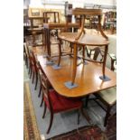 A GOOD GEORGE III DESIGN MAHOGANY TWIN PILLAR DINING TABLE with loose leaf. 7ft 9ins long 3ft wide.