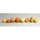 EIGHT PIECES OF REALISTIC CARVED AND PAINTED ALABASTER FRUIT.