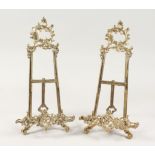 A PAIR OF BRASS EASELS 19ins high