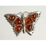 A SILVER AND AMBER BUTTERFLY PENDANT BROOCH