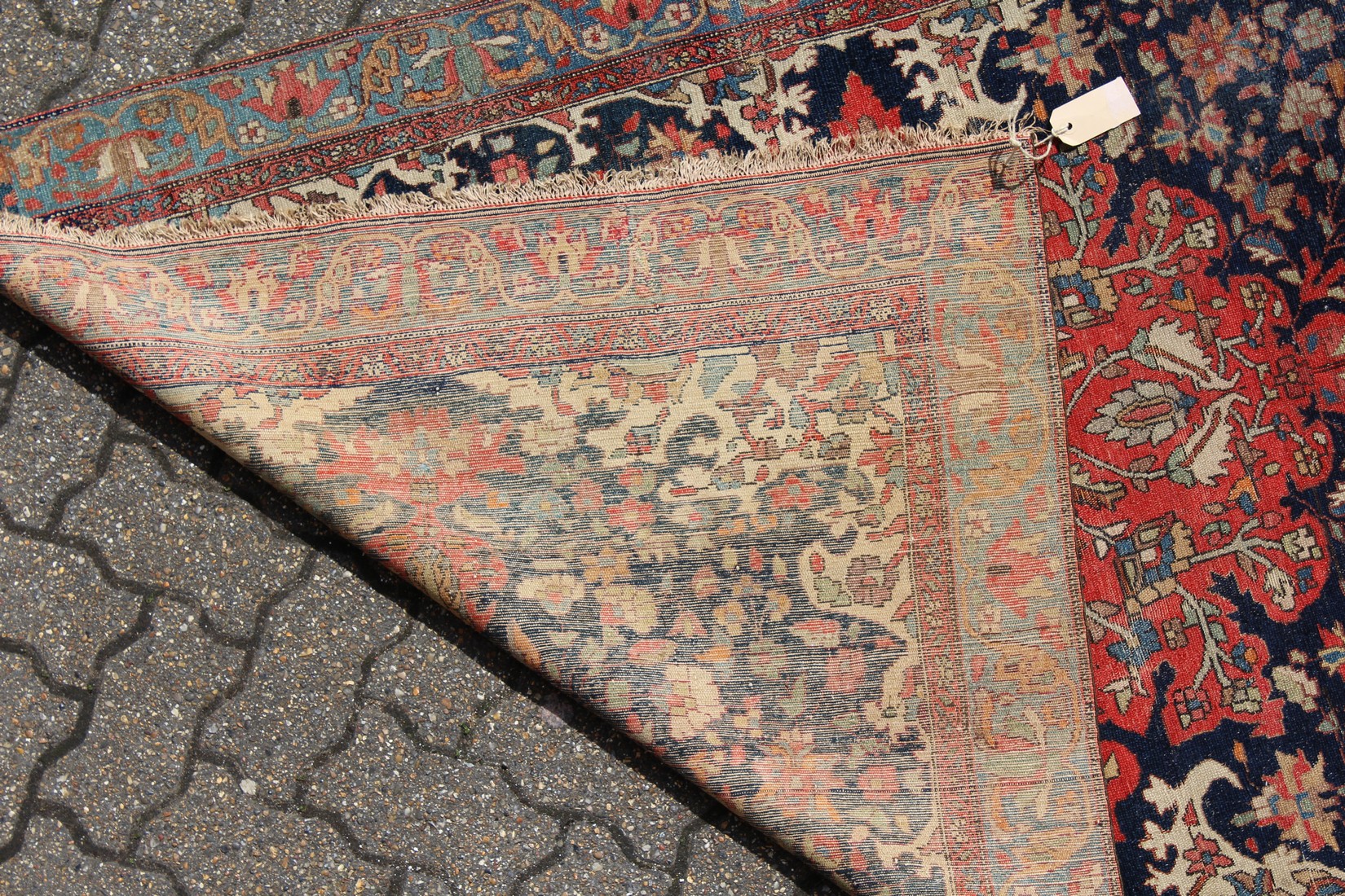 A GOOD MALAYER RUG, red ground with stylised floral decoration within, a pale blue border. 6ft 10ins - Image 2 of 2