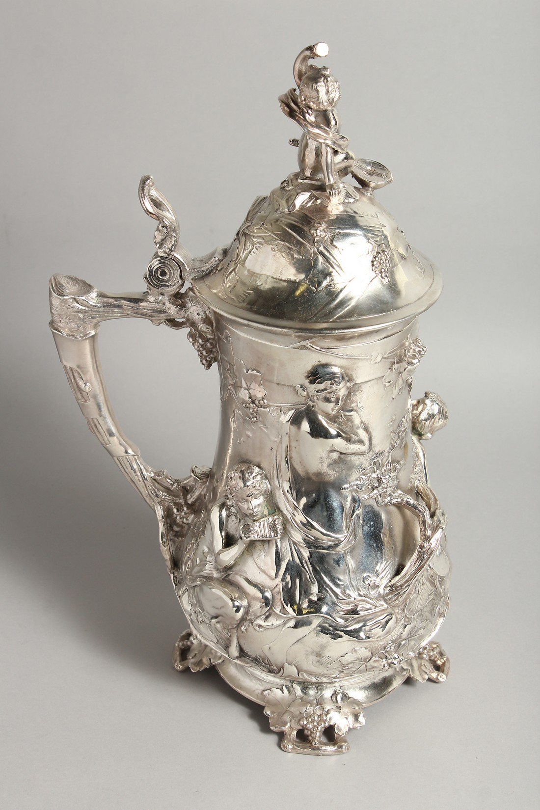 A GOOD W.M.F PLAIN TANKARD covered with classical repousse decoration. 16ins high. - Image 3 of 6