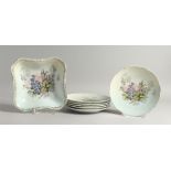 AN AUSTRIAN PORCELAIN FRUIT SERVICE, comprising a dish and six plates, each decorated with