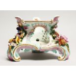 A 19TH CENTURY MEISSEN PORCELAIN STAND with painted decoration and encrusted with flowers. Cross