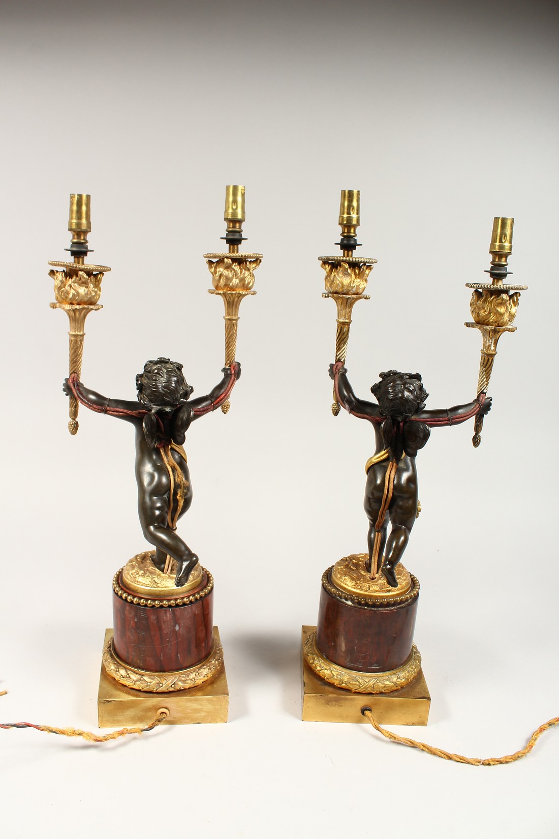 AS VERY GOOD PAIR OF REGENCY BRONZE AND ORMOLU TWO BRANCHED CHERUB CANDLESTICK each holding - Image 4 of 6