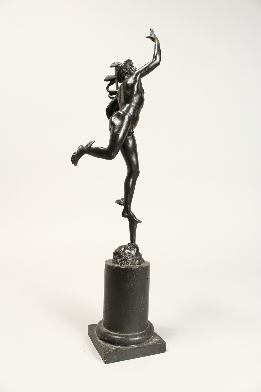 AFTER THE ANTIQUE A BRONZE OF MERCURY 12ins, on a plinth. - Image 3 of 4