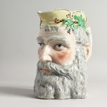 A CONTINENTAL PORCELAIN MASK JUG, man with a beard. 6ins high.