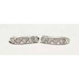 A PAIR OF 18CT WHITE GOLD AND DIAMOND HOOP EARRINGS. Diamonds approx.0.25ct.