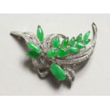 A SUPERB DIAMOND AND JADE FLORAL BROOCH set in18ct white gold