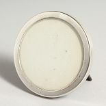 A TIFFANY SILVER PLAIN CIRCULAR PHOTOGRAPH FRAME 3.25ins diameter