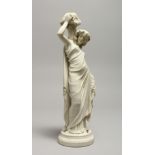 A PARIAN WARE FIGURE OF A CLASSICAL STANDING FEMALE, holding a basket of grapes 12ins high
