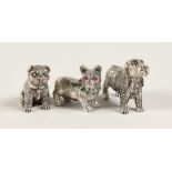 THREE CAST SILVER NOVELTY DOGS