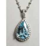 AN 18CT WHITE GOLD, AQUAMARINE AND DIAMOND PEAR SHAPE PENDANT AND CHAIN, the aquamarine approx. 4.