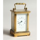 A 19TH CENTURY FRENCH BRASS CARRIAGE CLOCK retailed by Matthew Newman, London. 3.75ins high