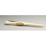 A PAIR OF CARVED IVORY GLOVE STRETCHERS 10ins long