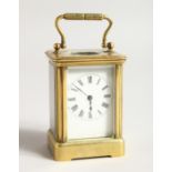 A 19TH CENTURY FRENCH BRASS CARRIAGE CLOCK 3ins high