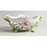 A GOOD MEISSEN PORCELAIN SHAPED AND PIERCED TWO HANDLED BASKET painted with flowers. Cross swords