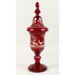 A SUPERB LARGE VICTORIAN BOHEMIAN RUBY GLASS GOBLET AND COVER etched with deer in a landscape. 20ins