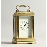 A 19TH CENTURY FRENCH BRASS CARRIAGE CLOCK. 3.75ins high