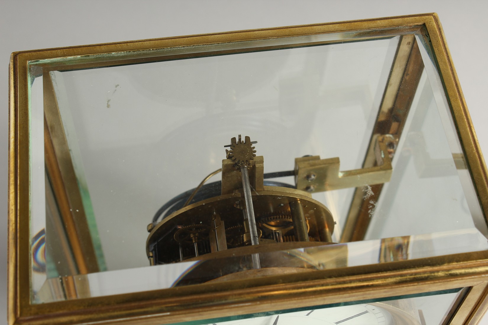 A GOOD BRASS FOUR GLASS CLOCK with white dial and pendulum. 12ins high. - Image 3 of 12