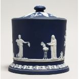 A GOOD ADAM BLUE AND WHITE JASPER WARE BISCUIT BARREL AND LID, decorated with depictions of the four
