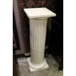 A CARVED AND PAINTED WOOD DORIC COLUMN 42ins high x 14ins wide.