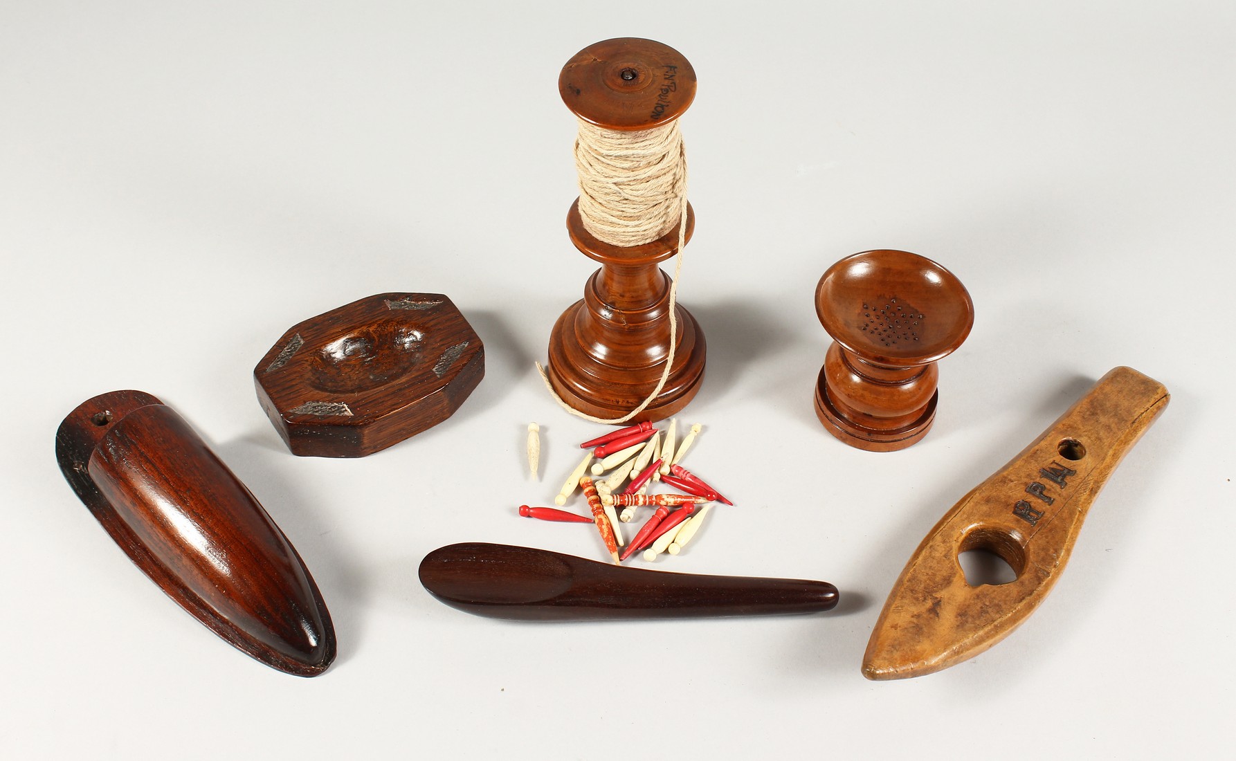 SIX VARIOUS ITEMS OF TREEN including a shuttlecock Stamped R.P.H.