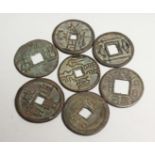 A BAG OF SEVEN CHINESE COINS