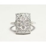 AN 18 CT. WHITE GOLD AND DIAMOND ART DECO STYLE RING Size O.