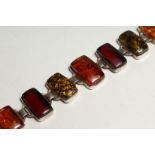 A SILVER AND AMBER BRACELET