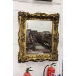 A LARGE AND IMPRESSIVE 19TH CENTURY GILT FRAMED MIRROR