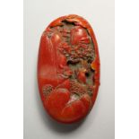 A CHINESE CARVED OVAL STONE PEBBLE 3.75ins long