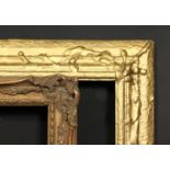 An early 20th century gilt composition frame, rebate size 19.75 x 23.75 , 50cm x 60cm, along with