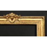 An early 20th century gilt composition frame with central cartouche, rebate size 19.75 x 16.5 , 50cm