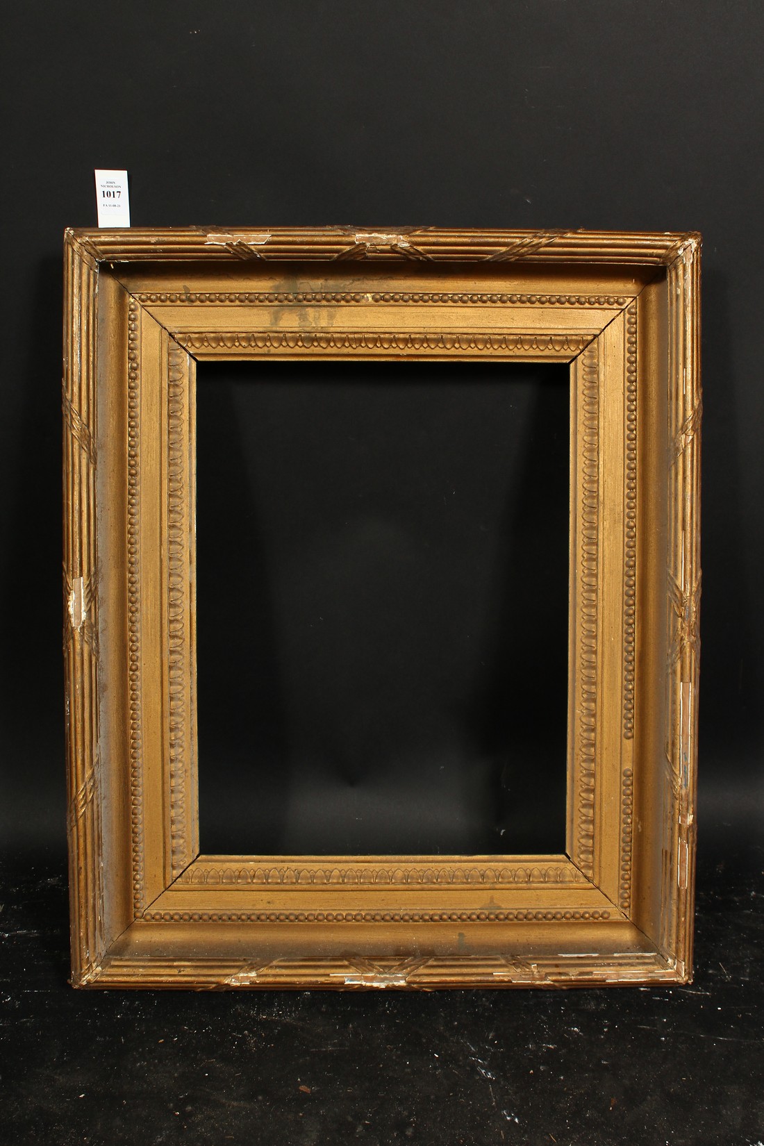 A 19th century gilt composition frame with moulded and ribbon tied top ornament, rebate size 13 x - Image 2 of 3